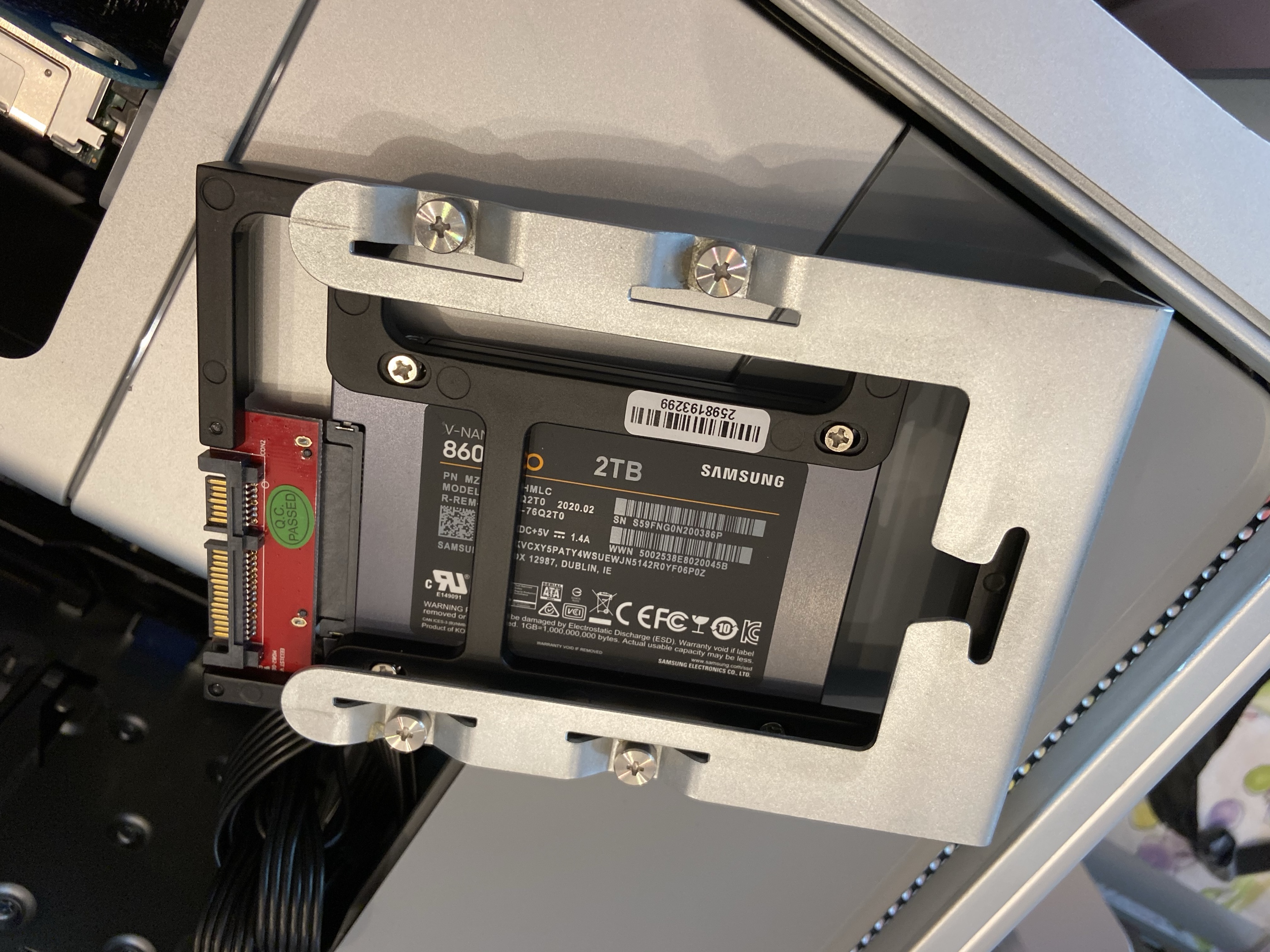 Samsung 2TB SSD bolted into a Mac Pro optical-drive caddy
